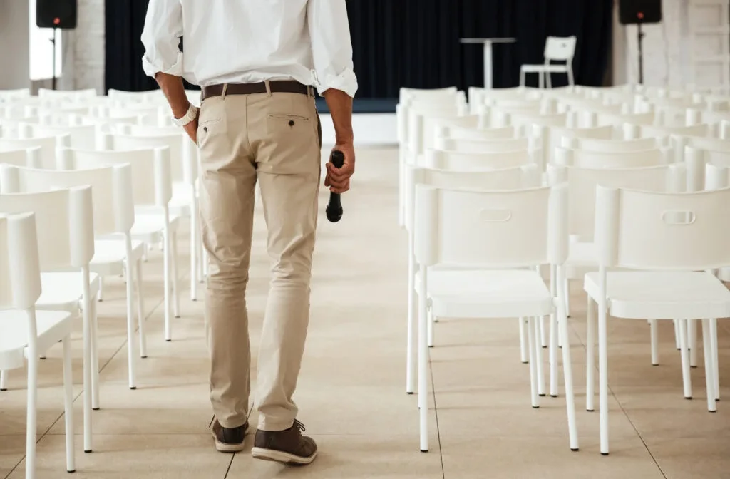 cropped-image-young-african-man-standing-office-1024x683
